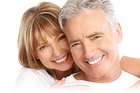 elderly couple smiling